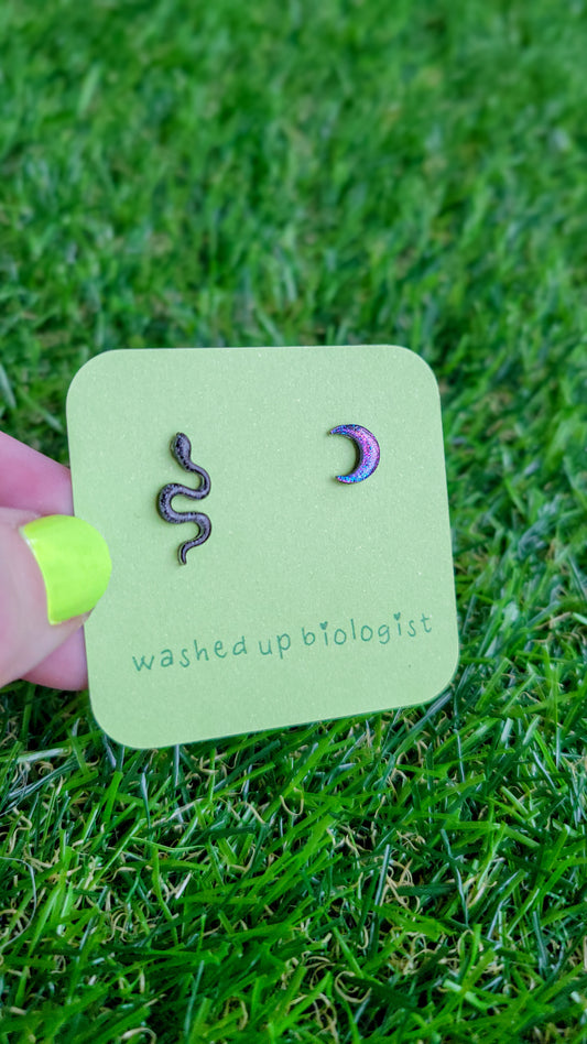 iridescent black snake and blue purple crescent moon hypoallergenic stud earrings