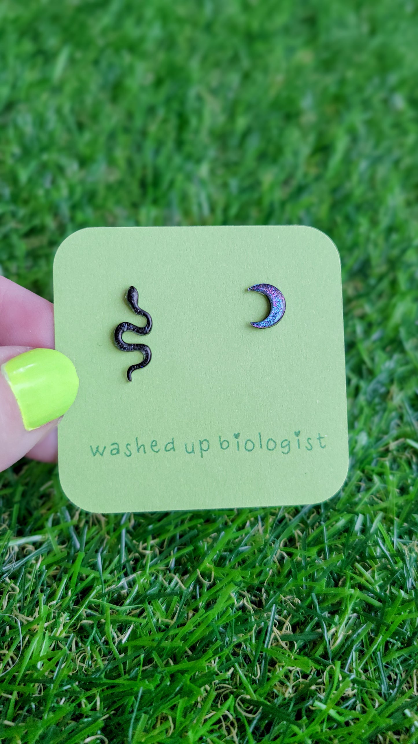 iridescent black snake and blue purple crescent moon hypoallergenic stud earrings