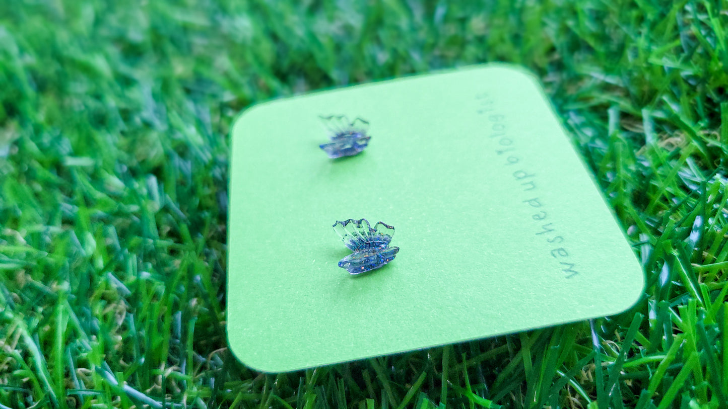 translucent iridescent glittery blue butterfly hypoallergenic stud earrings
