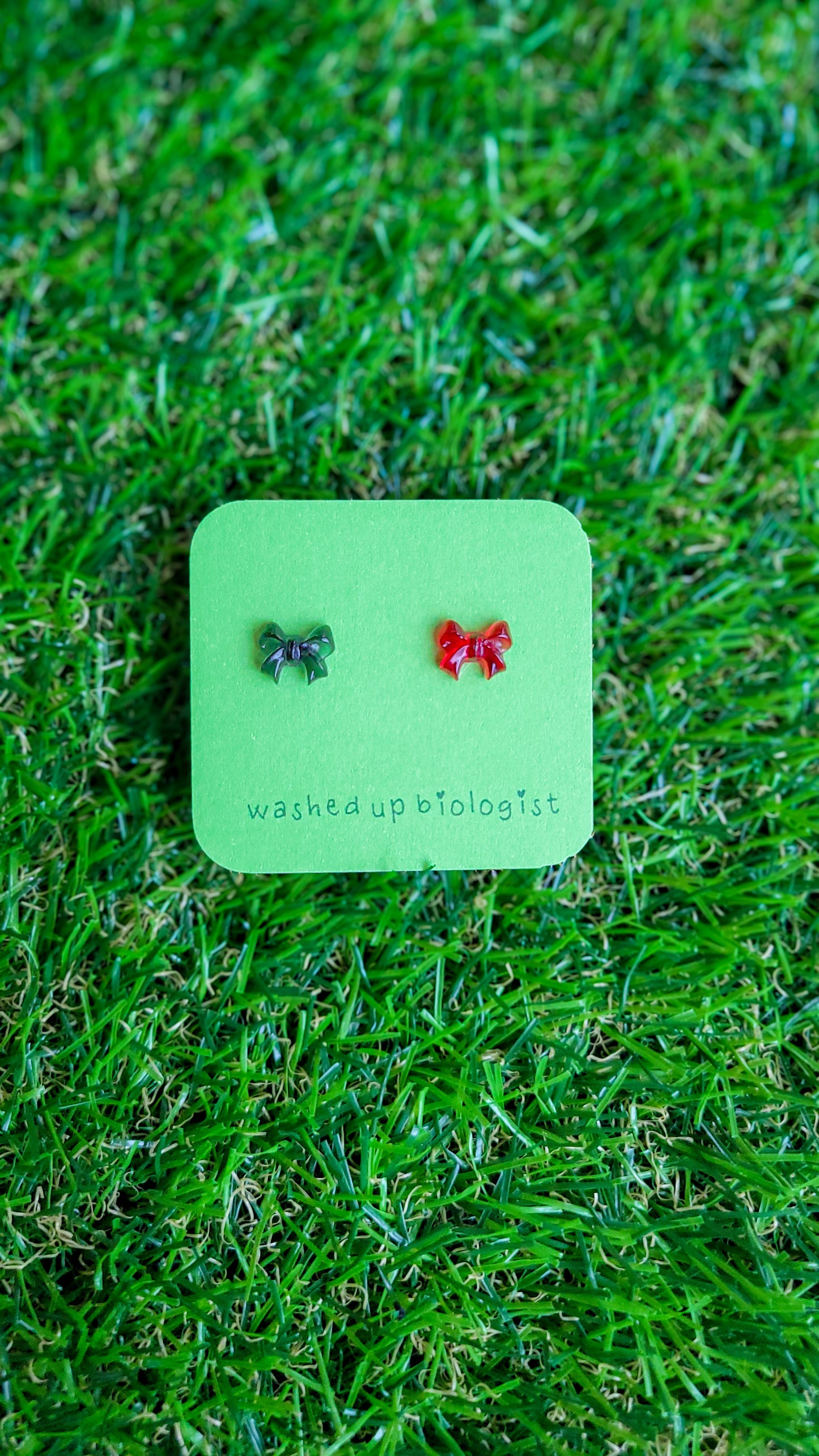 mismatched translucent black and red bows hypoallergenic stud earrings