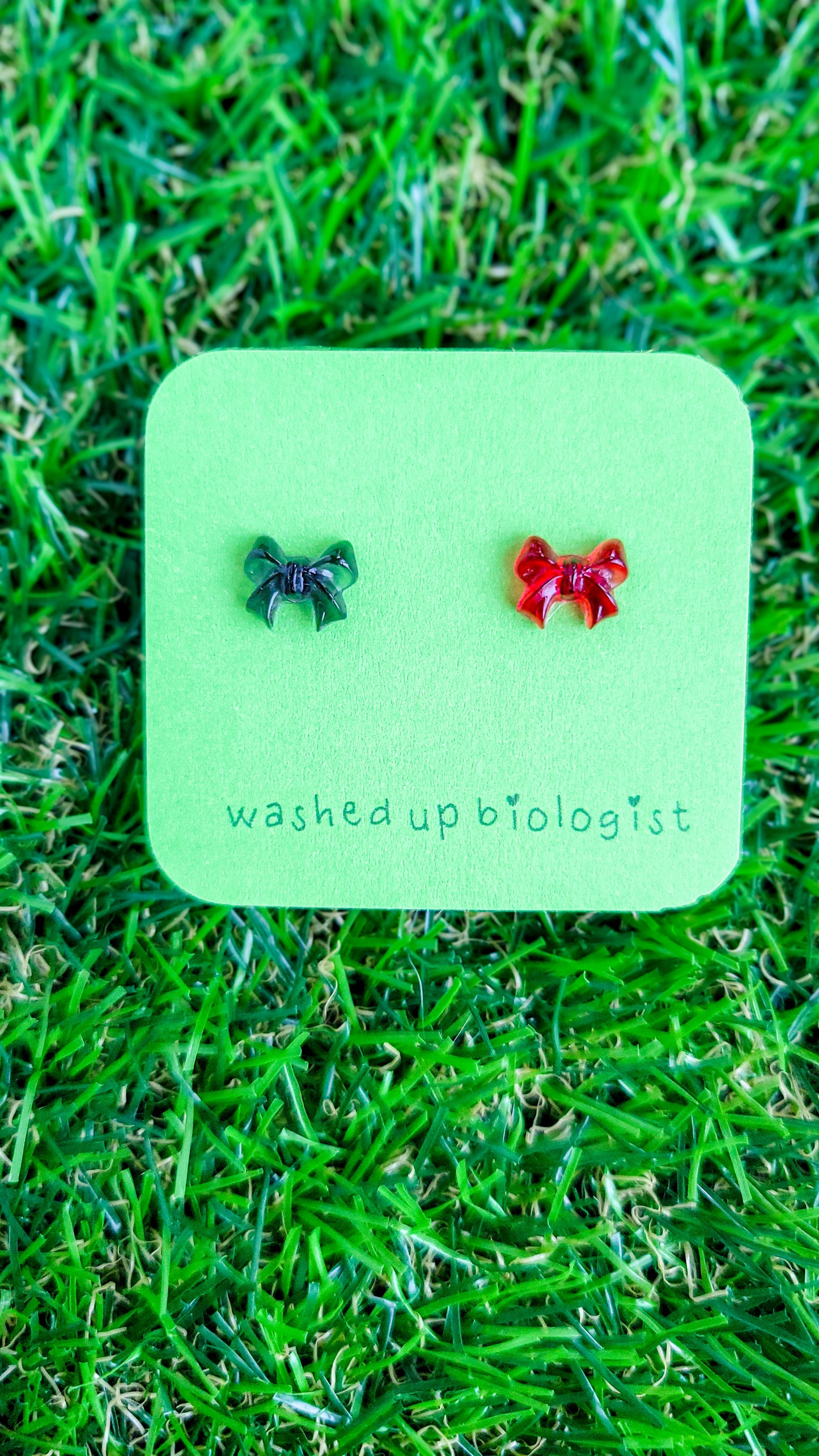 mismatched translucent black and red bows hypoallergenic stud earrings