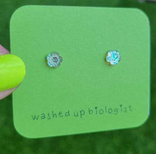 iridescent clear flowers hypoallergenic stud earrings