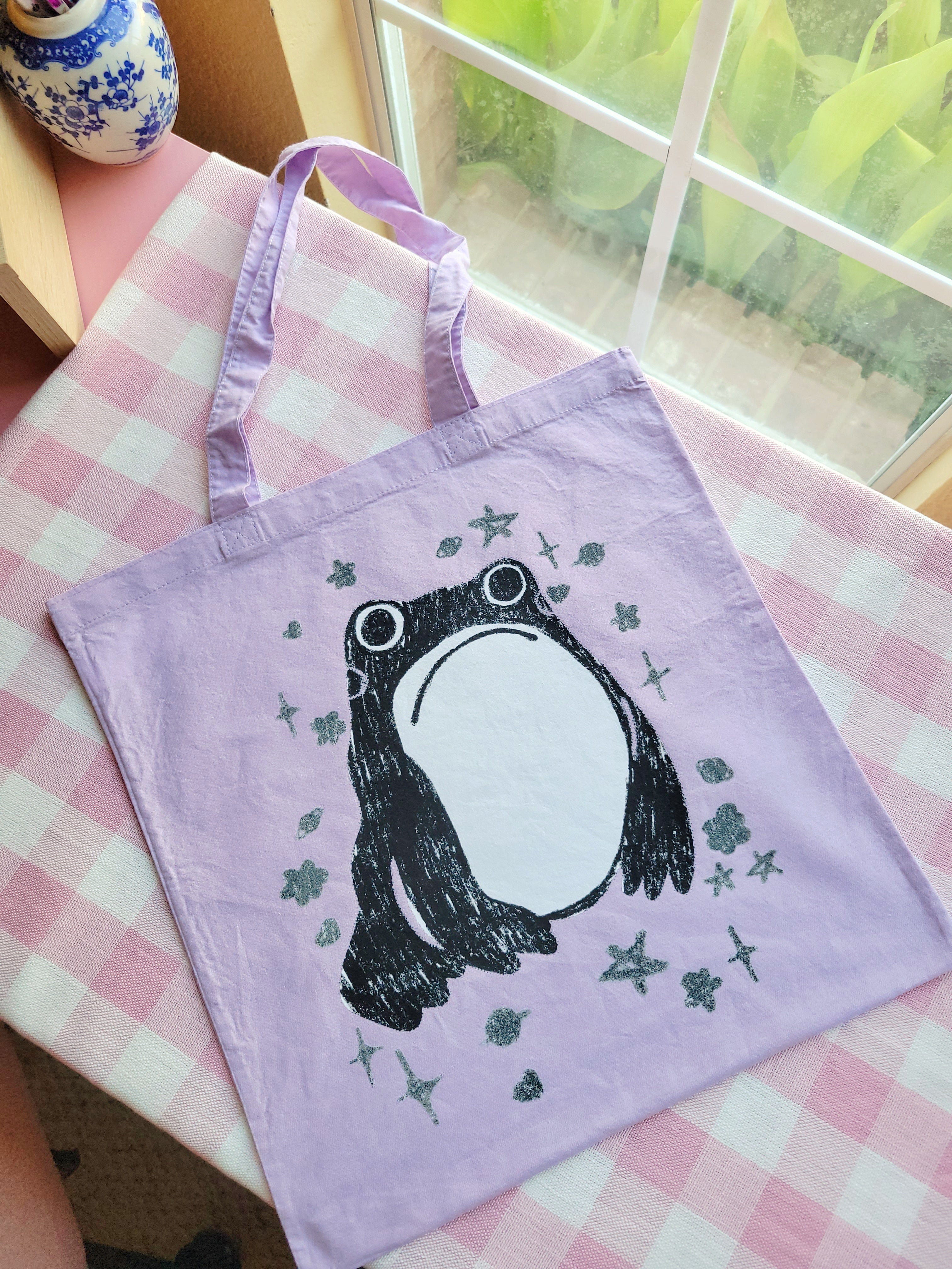 unimpressed frog light purple lightweight tote bag heat pressed