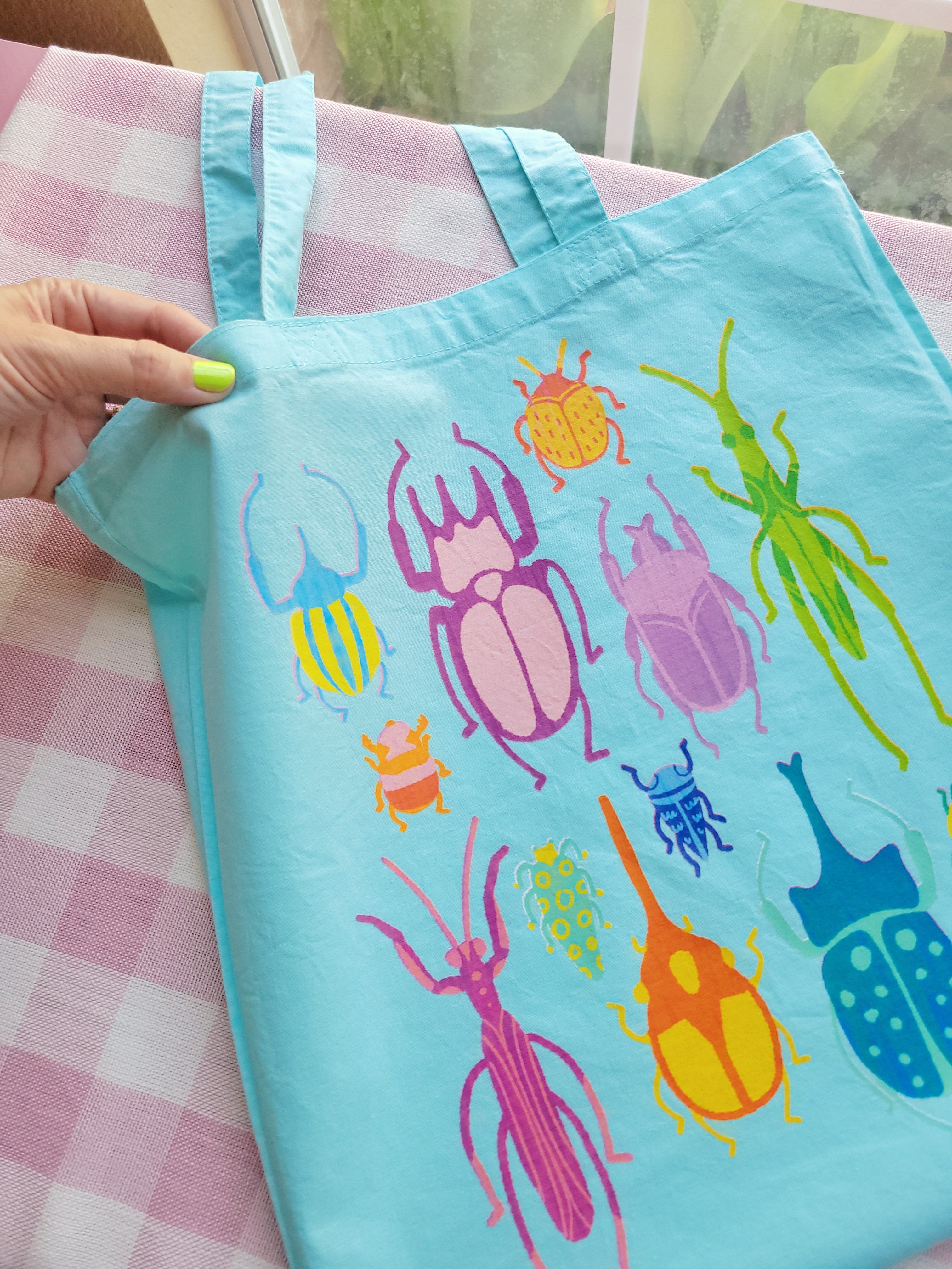 bright bugs light blue lightweight tote bag heat pressed