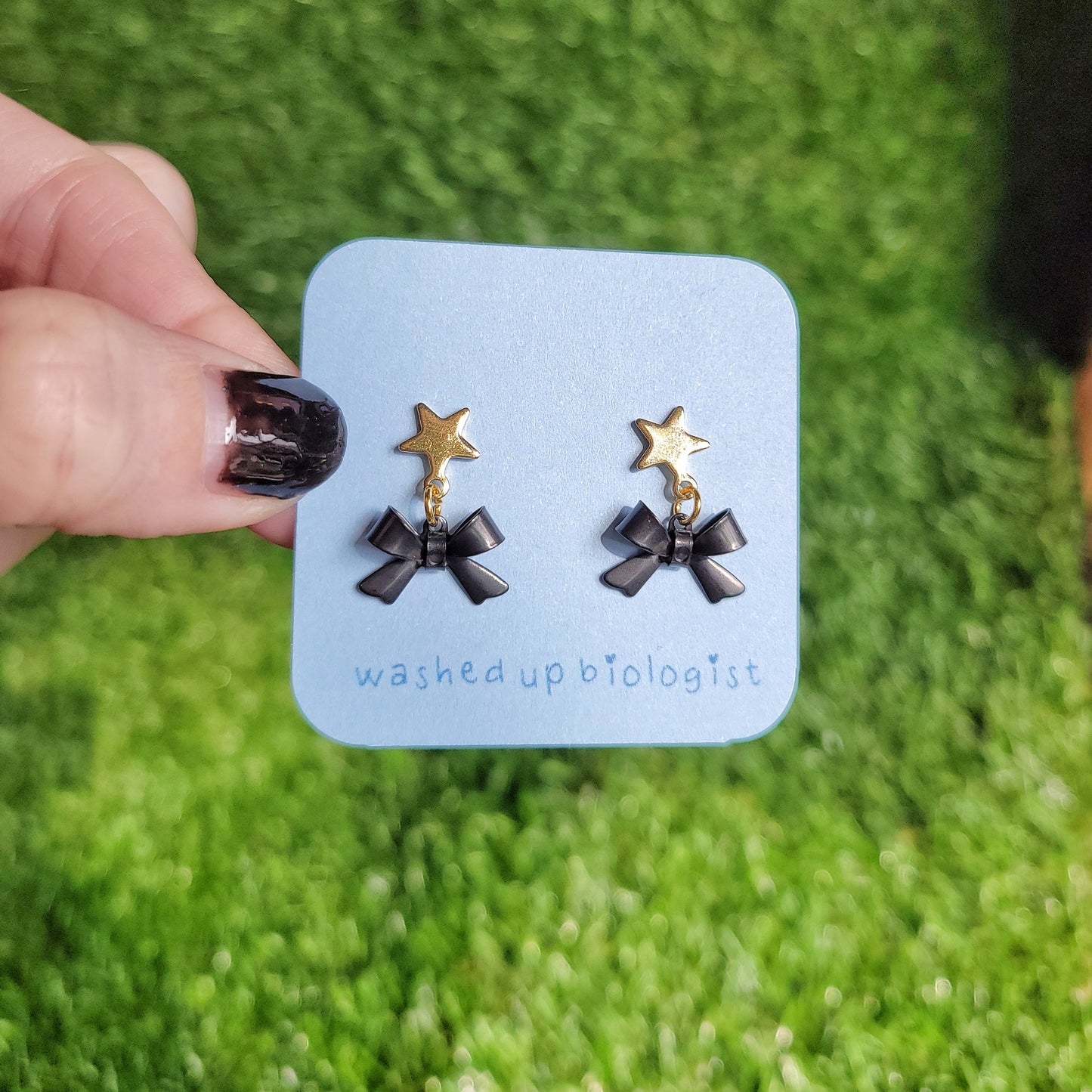 black bow dangly star stud earrings